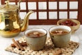 Sujeonggwa, Korean Traditional Cinnamon Punch. Dark Reddish Brown in Color, it is Made from Cinnamon Stick, Gotgam, and Ginger Royalty Free Stock Photo