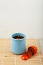 Sujeonggwa is persimmon tea. Korean fruit punch made from persimmons fruit with pine nuts