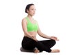 Sukhasana yoga pose with pillow