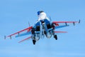 Sukhoi Su-27 04 BLUE jet fighter of Russian Knights aerobatics team landing at Kubinka air force base.