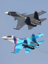 Sukhoi Su-30SM 56 RED an Su-27UB 17 RED of russian air force perfoming demonstration flight in Zhukovsky during MAKS-2015 airshow.