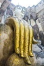 SUKHOTHAI THAILAND.The Main Buddha with golden hand in the temple.