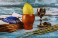 Sukkot Jewish festival of traditional religious symbol Etrog, lulav, hadas, arava kippah tallit praying book Royalty Free Stock Photo