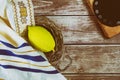 Sukkot Jewish festival of traditional religious symbol Etrog, lulav, hadas, arava kippah tallit praying book Royalty Free Stock Photo