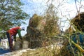 Farmers are grinding rice with a mobile rice milling machine.