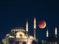 Suleymaniye Mosque with eclipsed moon. Islamic background image Royalty Free Stock Photo