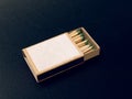 Sulfur matches in a box on a black background