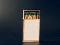 Sulfur matches in a box on a black background