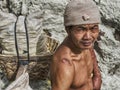 Sulfur Miner at Kawah Ijen Volcano in East Java, Indonesia