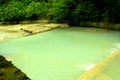 sulfur river flowing in the mountains