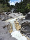 Severals waterfalls in north lombok indonesia water flooding between grey rocks in the mountains