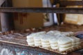 Sulguni cheese close up, street market showcase.