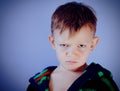 Sulky angry little boy Royalty Free Stock Photo