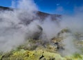 Sulphur gas coming out of the edge of the volcanic crater on the Vulcano island in the Aeolian islands, Sicily, Italy Royalty Free Stock Photo