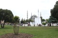 The Sultan Ahmed Mosque (Blue Mosque) and fountain view from the Sultanahmet Park in Istanbul, Turkey Royalty Free Stock Photo