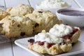 Sultana Scones with Jam and Cream on the Table Royalty Free Stock Photo