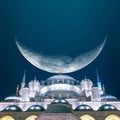 Sultanahmet or Blue Mosque with crescent moon. Ramadan concept image.