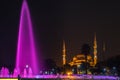 Sultanahmet Square with the Blue Mosque and an illuminated fountain in the night in Istanbul Royalty Free Stock Photo