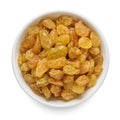 Sultanas raisin in white bowl isolated on white. Top view Royalty Free Stock Photo