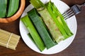 Suman pinipig with buko latik Royalty Free Stock Photo