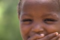 Detailed view of a child with expressive look on his face and eyes, portrait of African Angolan boy