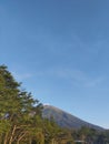 Sumbing mountain and blue sky Royalty Free Stock Photo