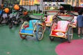 mini rickshaws at the Jatinangor National Flower Park tourist attraction in the afternoon