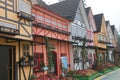 a unique miniature model of a mini house with various colors and a flower garden at the National Flower Park tourist attraction