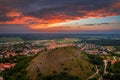 Sumeg, Hungary - Aerial panoramic view of the famous High Castle of Sumeg in Veszprem county at sunset with storm clouds Royalty Free Stock Photo