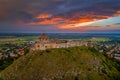 Sumeg, Hungary - Aerial panoramic view of the famous High Castle of Sumeg in Veszprem county at sunset with storm clouds Royalty Free Stock Photo