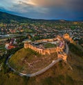 Sumeg, Hungary - Aerial panoramic view of the famous High Castle of Sumeg in Veszprem county at sunset with storm clouds Royalty Free Stock Photo