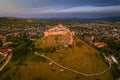 Sumeg, Hungary - Aerial panoramic view of the famous High Castle of Sumeg in Veszprem county at sunset with storm clouds Royalty Free Stock Photo