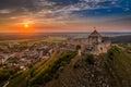 Sumeg, Hungary - Aerial view of the famous High Castle of Sumeg in Veszprem county at sunset with colorful clouds Royalty Free Stock Photo