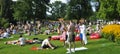 Sumertime at the boarder of lake ZÃÂ¼rich: Masses of peoples relaxing, grilling and enjoying the sunshine in the chines garden lake Royalty Free Stock Photo