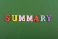 SUMMARY word on green background composed from colorful abc alphabet block wooden letters, copy space for ad text. Learning