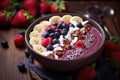 Summer Acai smoothie bowl with various fruits and berries. Healthy breakfast