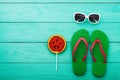 Flip flops. Beach holidays. Summer accessories and copy space on blue wooden background. Top view. Mock up. Copy space Royalty Free Stock Photo