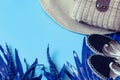 Summer accessories, shoes and hat with bag on blue background Royalty Free Stock Photo