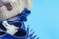 Summer accessories, shoes and hat with bag on blue background Royalty Free Stock Photo