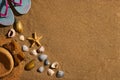 Summer accessories straw hat, glasses, shoes at the beach sand Royalty Free Stock Photo