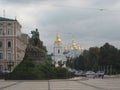 summer afternoon stroll along the street of Kiev view of the cathedral and monument