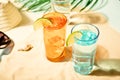 Summer alcoholic cocktails in colorful glasses on beach with white sand. Summer sea ocean vacation and travel concept Royalty Free Stock Photo