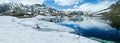 Summer Alps mountain lake panorama (Switzerland) Royalty Free Stock Photo