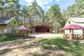 Summer amphitheater in the pinery forest with colored benches