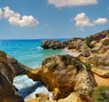 Summer Atlantic rocky coast view Albufeira outskirts, Algarve, Portugal Royalty Free Stock Photo