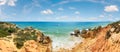 Summer Atlantic rocky coast view Albufeira outskirts, Algarve, Portugal. Panorama Royalty Free Stock Photo