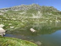 Summer atmosphere on the Lago dei Morti or Lake of the Dead Totensee in the Swiss alpine area of mountain St. Gotthard Pass