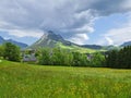 Summer austrian landscape with green meadows and impressive mountains, view from small alpine village Tauplitz, Styria region, Royalty Free Stock Photo