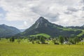 Summer austrian landscape with green meadows and impressive mountains, view from small alpine village Tauplitz, Styria region, Royalty Free Stock Photo