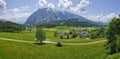 Summer austrian landscape with Grimming mountain 2.351 m, an isolated peak in the Dachstein Mountains, view from small alpine Royalty Free Stock Photo